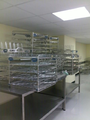 Washer or disinfectors trays returned to the decontamination area via pass-through hatch(Tygerberg hospital).png